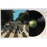 The Beatles - Abbey Road LP ( PCS 7088 ), original pressing with misaligned Apple Logo.