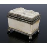 Early 20th Century casket, the cream marble effect lid with two raised oval panels depicting