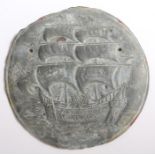 Lead plaque, in the form of a Fire insurance mark with a galleon at sail, 31cm diameter