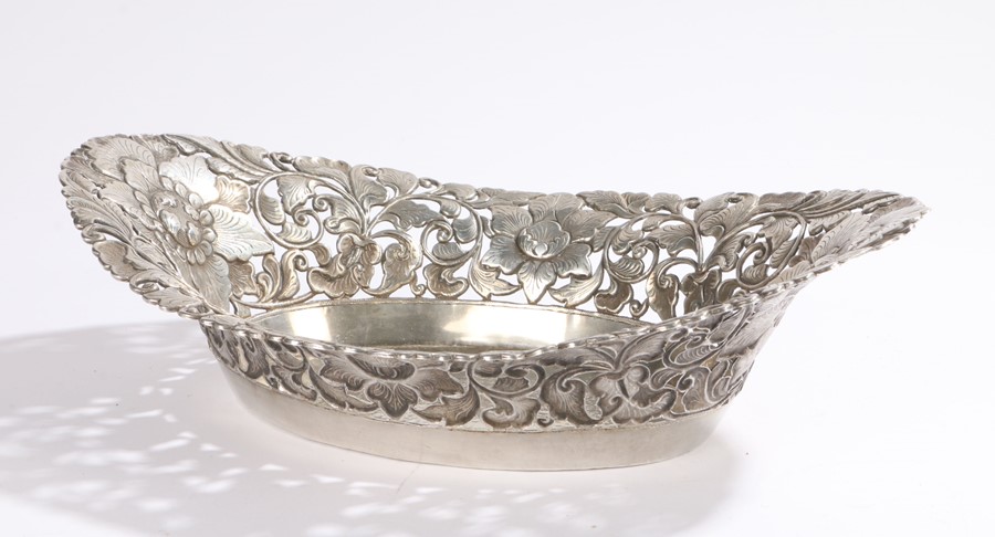 Danish silver bowl, of oval form with pierced and embossed scroll and foliate decoration, stamped