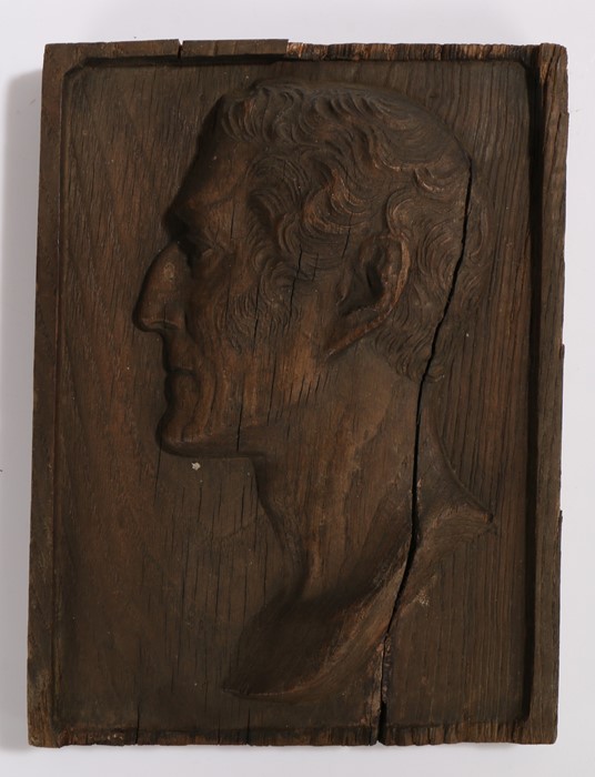 Carved oak panel depicting Lord Wellington in profile, 18cm x 24cm