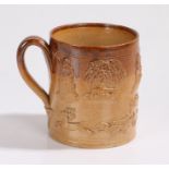 19th Century stoneware shaving mug, with raised hunting and drinking scenes, 11.5cm high