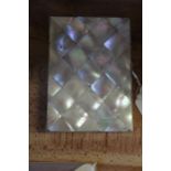 19th Century mother of pearl card case, with interior purple divides, 8cm x 11cm