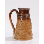 19th Century stoneware shaving mug, with raised hunting and drinking scenes, 13.5cm high