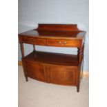 Edwardian mahogany, satinwood, ebony and boxwood strung bow front buffet, with raised upstand