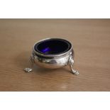 Victorian silver salt, London 1865, maker Henry Holland, with blue glass liner and beaded rim,