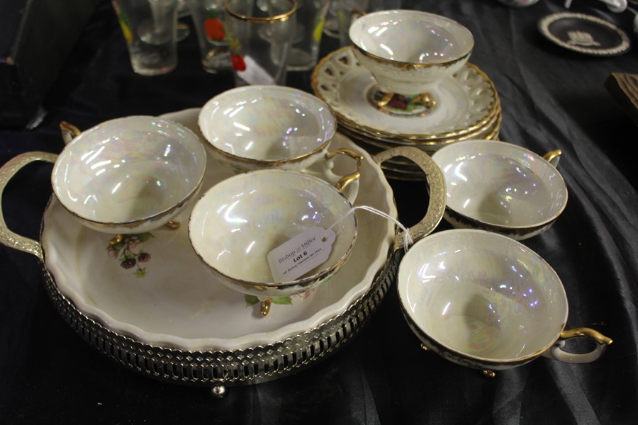 Eiho Japan porcelain tea service, decorated with a courting couple, consisting of six tea cups and