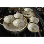 Eiho Japan porcelain tea service, decorated with a courting couple, consisting of six tea cups and