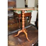 Mahogany wine table, the circular tilt top raised on a bobbin turned stem and tripod legs, 44cm