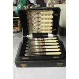 Cased set of six fish knives and forks, cased set of fruit spoons with serving spoon (2)