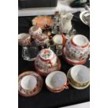 Japanese part tea service, to include teapot sugar bowl, four cups and saucers, decorative glassware