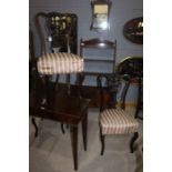 Set of three Edwardian salon chairs, with carved splat backs and stuff over seats, (3)