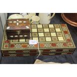 Mother of pearl inlaid games compendium, with chess and backgammon boards, mother of pearl inlaid