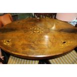 Victorian marquetry inlaid loo table, the oval tilt top raised on quadruple turned supports and