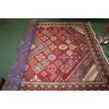Middle Eastern Mahal rug, the red ground decorated with cartouches and geometric patterns, 201cm x
