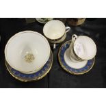 New Chelsea Staffordshire part tea service, the blue mottled ground with gilt scroll decoration,