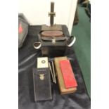 Scientific equipment, to include E Leitz Wetzlar microscope, electric thermometer, pair of