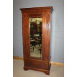 Maple & Co mahogany wardrobe, with a cornice above the mirror door and drawer to the base