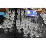 Glassware to include John Jenkins crystal bowl in original box, champagne flutes, wine glasses