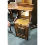 Edwardian mahogany coal purdonium, with shelf above a bevelled mirror and fall front coal