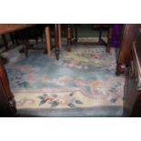 Chinese style rug, the cream and blue ground with foliate decoration