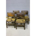 Set of eight oak 17th Century Spanish style dining chairs, with pad backs and seats above a carved