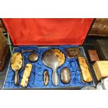 Faux tortoise shell dressing table set, consisting of , hand mirror, hair brush, clothes brush, nail