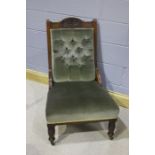 Edwardian parlour chair, the mahogany frame with carved decorations to the top, above a button