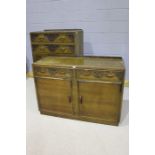 Art Deco style cupboard, the rectangular top above two drawers decorated with roses, above two