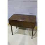 19th Century mahogany Pembroke table, the rectangular top above a drawer, raised on square legs,