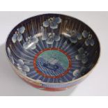 20th Century Japanese porcelain bowl, the central field with depiction of a ship surrounded by an