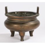 Chinese Qing Dynasty bronze censer, the censer surmounted by a pair of rectangular angled loops