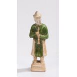 Chinese tomb warrior, modelled holding a musical instrument, 25.5cm high