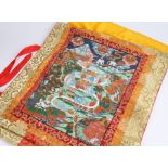 Oriental silk and polychrome painted thangka, depicting the life of Buddha, 99cm x 64cm