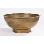 Indian brass bowl, with an arched design to the collar, 29cm wide