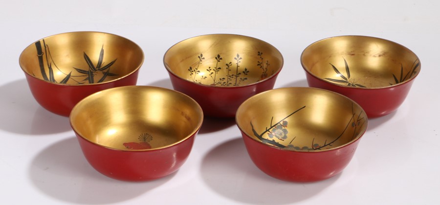 Set of five Japanese lacquered bowls, with bamboo, goldfish and blossom decoration to the - Image 2 of 2