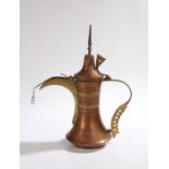 Middle Eastern copper and brass coffee pot, with foliate decoration, 34.5cm high