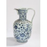 Chinese porcelain ewer, the neck with spout and scroll decorated handle above a bulbous foliate