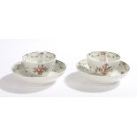 Pair of 18th Century Chinese export porcelain tea bowls and saucers, with foliate and wavy line