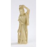 Chinese soapstone figure, of a standing figure with a hand above her head, 35.5cm high