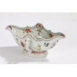 Chinese porcelain famille rose sauceboat, with foliate decoration and loop side handles