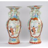 Large pair of Japanese porcelain Meiji period vases, with flower head design to the wide lip above