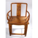 Chinese carver chair, the curved splat with carved foliate decoration, panelled seat, raised on