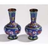 Pair of Chinese cloisonne vases, the blue ground with butterfly and foliate decoration, 21cm high