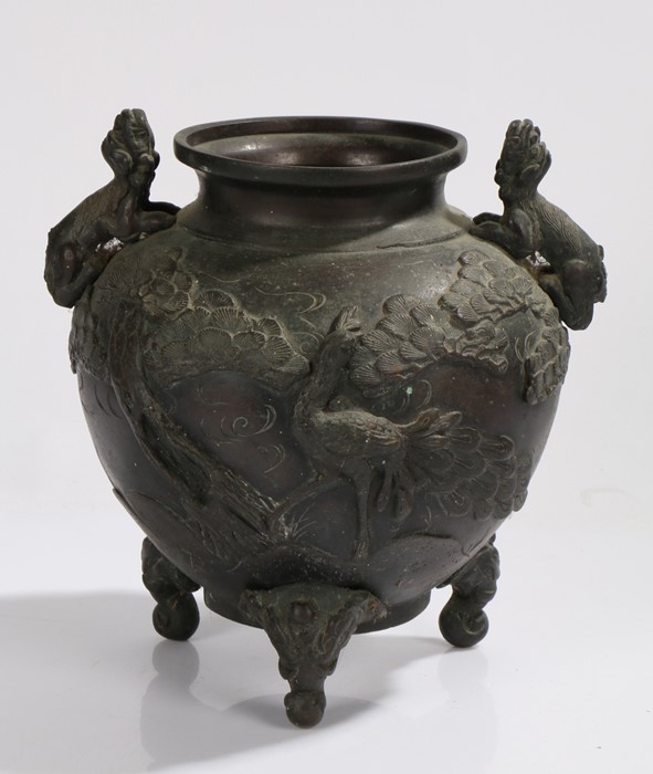 Japanese bronze jardiniere, with dog of fo form handles, the body with raised bird and foliate