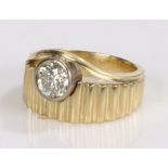 14 carat gold diamond set ring, the round cut diamond to the wide ribbed shank, ring sizeO