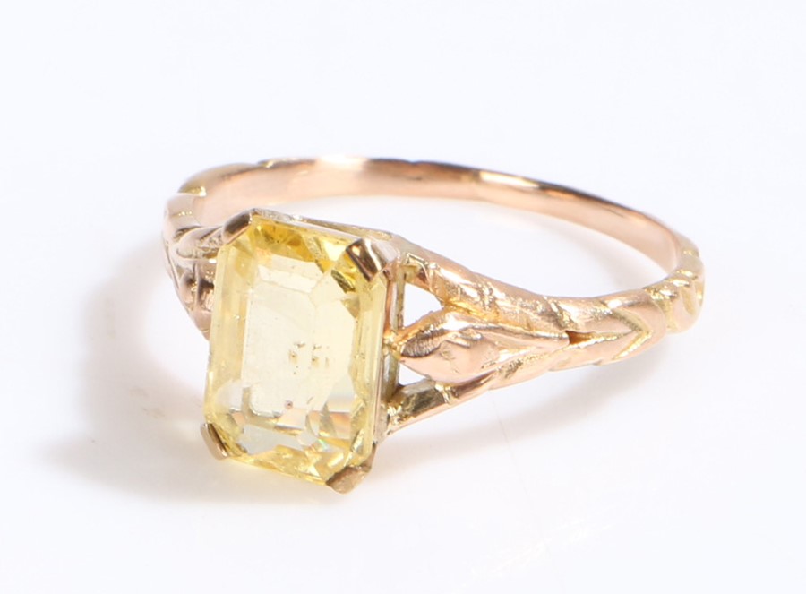 Yellow sapphire set ring, the emerald cut sapphire at 3.60 carats, ring size M