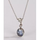 Sapphire and diamond set necklace, the pendant with two diamonds above the 6.10 carat sapphire