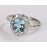 18 carat white gold aquamarine and diamond set ring, the central aquamarine at 2 carats and a