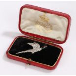 Diamond and enamel brooch, in the form of a flying pheasant with an enamel head, 45mm long